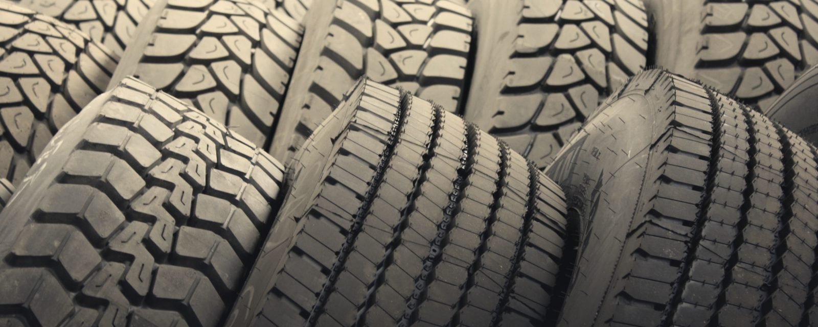 Stacked tyres of varying tread patterns